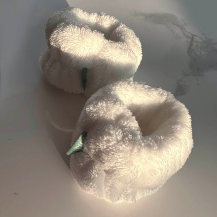 La PIEL Face Washing Wristbands White Pair On Marble Closeup