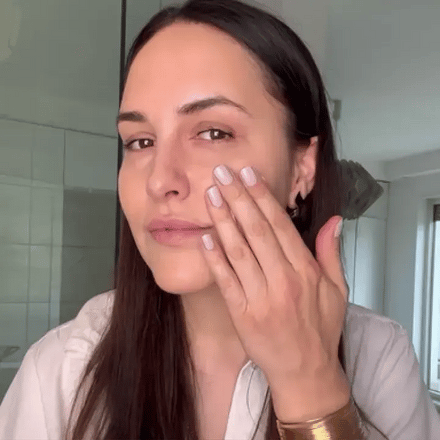 La PIEL Glow Face Cream Model Applying Product