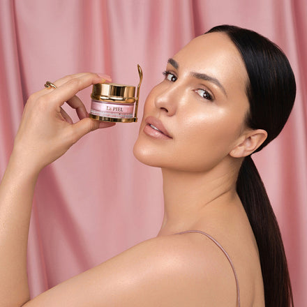 La PIEL Glow Face Cream Model Holding Product