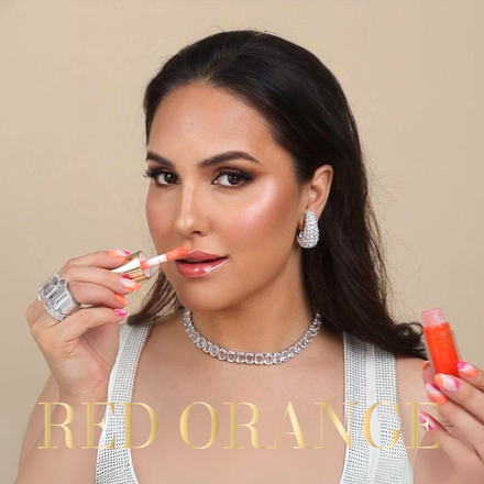 La PIEL Juicy Lips Red Orange Lip Oil Dark Hair Model