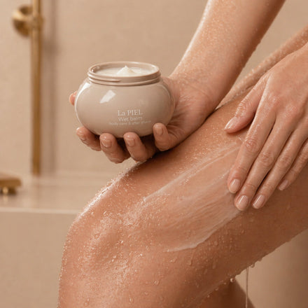 La PIEL Pentavitin Body Cream Application On Leg Closeup