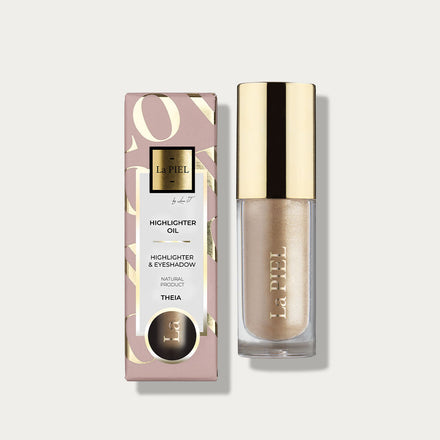La PIEL Theia Highlighter Oil Pakiranje I Bocica Na Svijetloj Pozadini